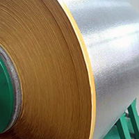 Kraft paper clad stucco embossed aluminum coil